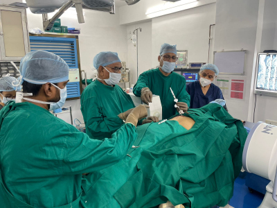 Dr. Dhruv Patel, Orthopaedic, Joint Replacement, Arthroscopic & Trauma Surgeon and his team operating orthopaedic surgeries in operation theatre in Navi Mumbai.